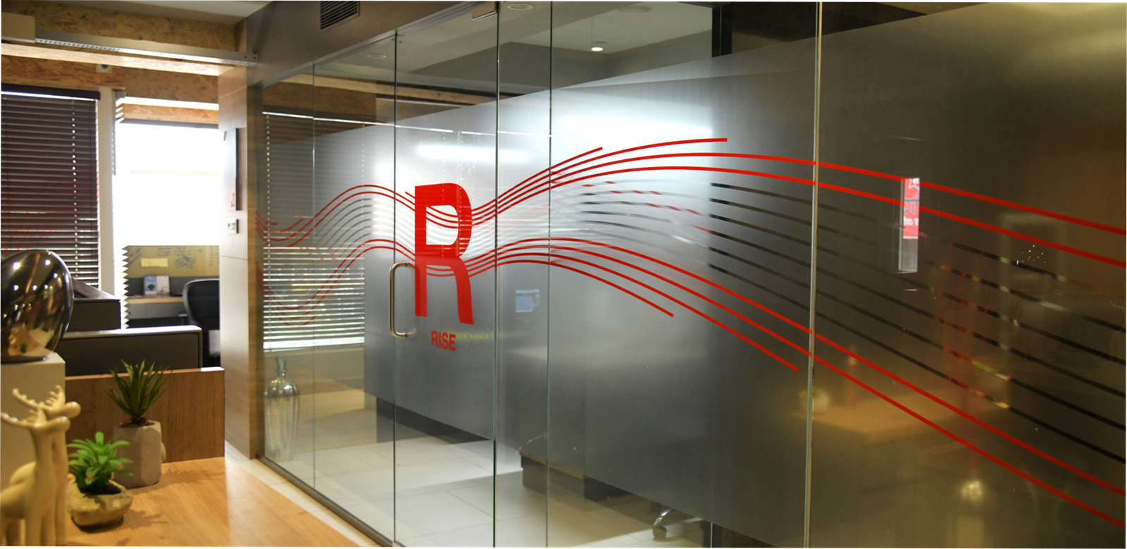 Office environmental graphics — glass partition branding