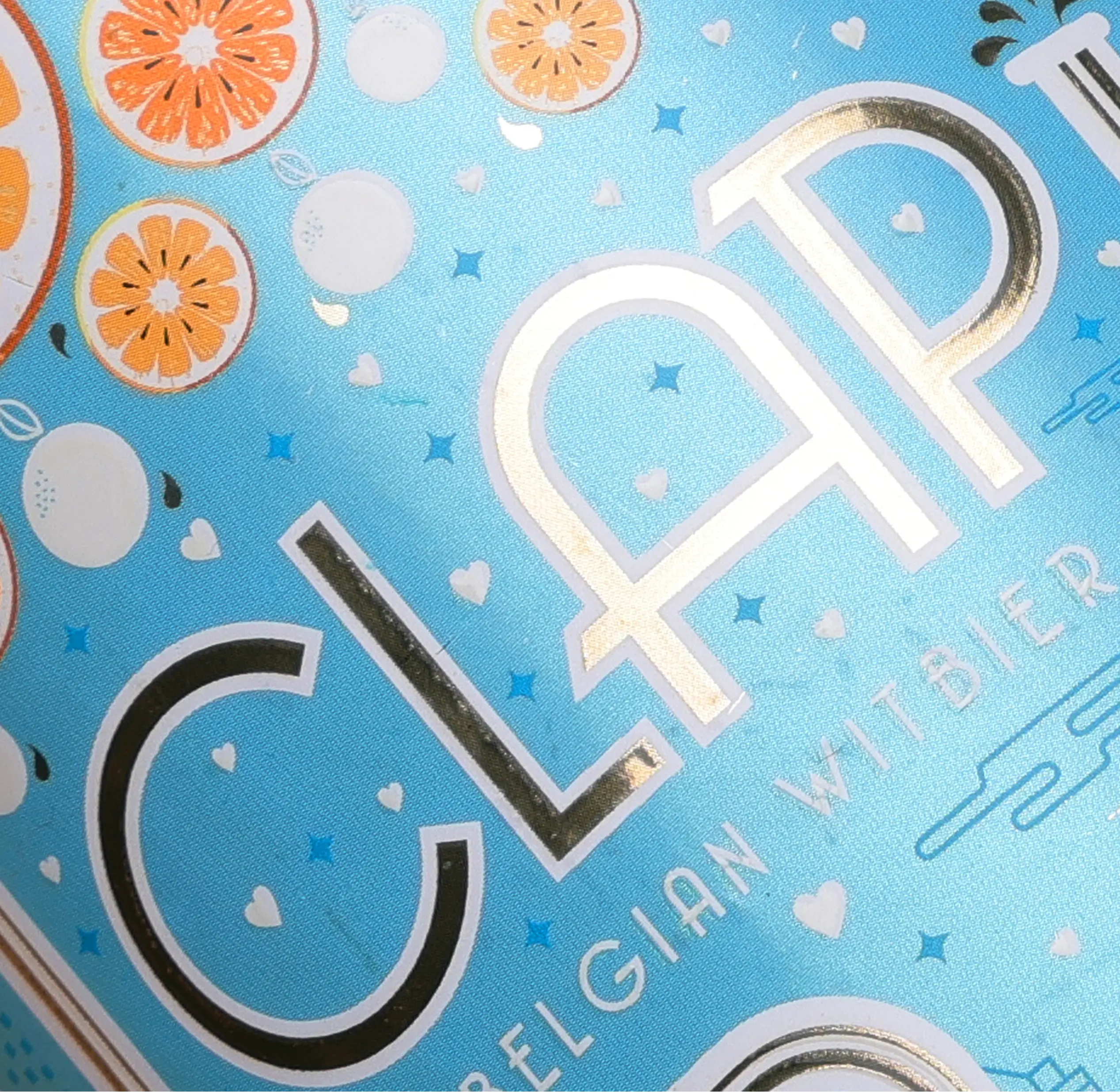 CLAP Belgian Witbier label closeup with citrus illustrations and gold foil